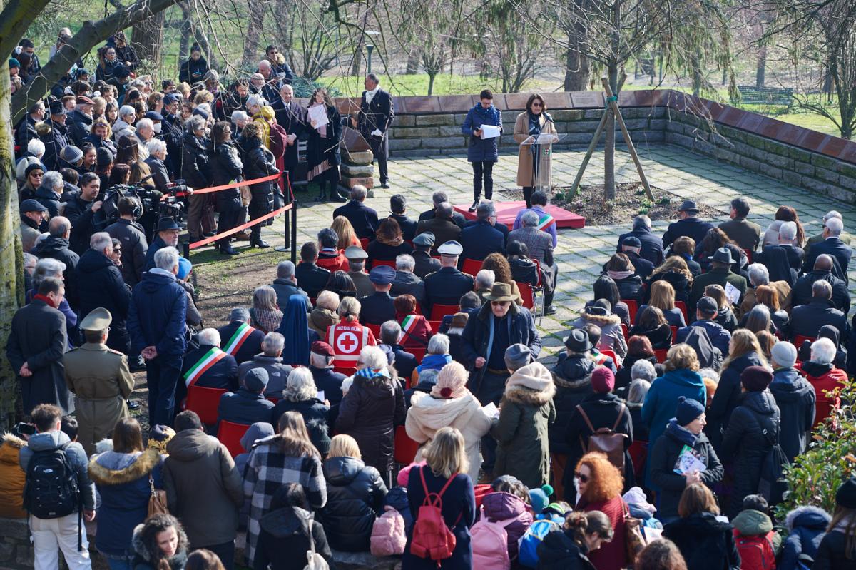 Mrs Gabriel Cox, Sir Hersch Lauterpacht's granddaughter, delivers a speech about her grandfather in the Gardens of the Righteous in Milan
