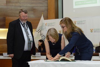 Louise Gullifer signing the Final Act of the Diplomatic Conference